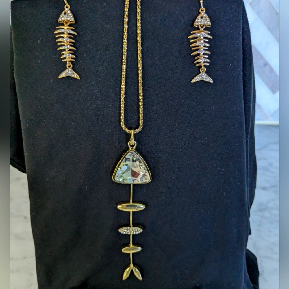 Fishbone design necklace and earrings. Gold tone. Like new.